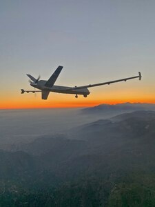 An MQ-9 Reaper remotely piloted aircraft flown by 163d Attack Wing pilot Lt. Col. Paul Brockmeier, with sensor operator Master Sgt. Anthony Martinez, views the smoky San Gabriel Mountains of southern California on the way to a fire mission in northern California in late August 2020.
