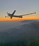 An MQ-9 Reaper remotely piloted aircraft flown by 163d Attack Wing pilot Lt. Col. Paul Brockmeier, with sensor operator Master Sgt. Anthony Martinez, over the smoky San Gabriel Mountains of southern California on the way to a fire mission in northern California in late August 2020.