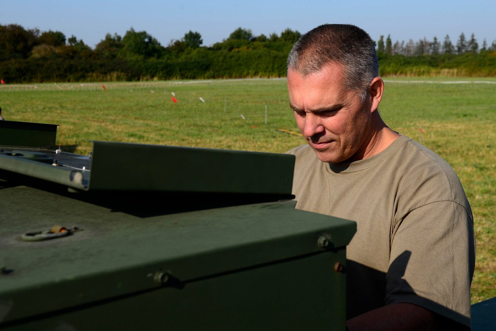 U.S. Air National Guard Master Sgt. Jared Hass, 116th Air Control Squadron, checks a generator during exercise Astral Knight 20 at Malbork Air Base, Poland, Sept. 23, 2020. Members of the 116th and 128th ACS augmented the 606th ACS during AK20.