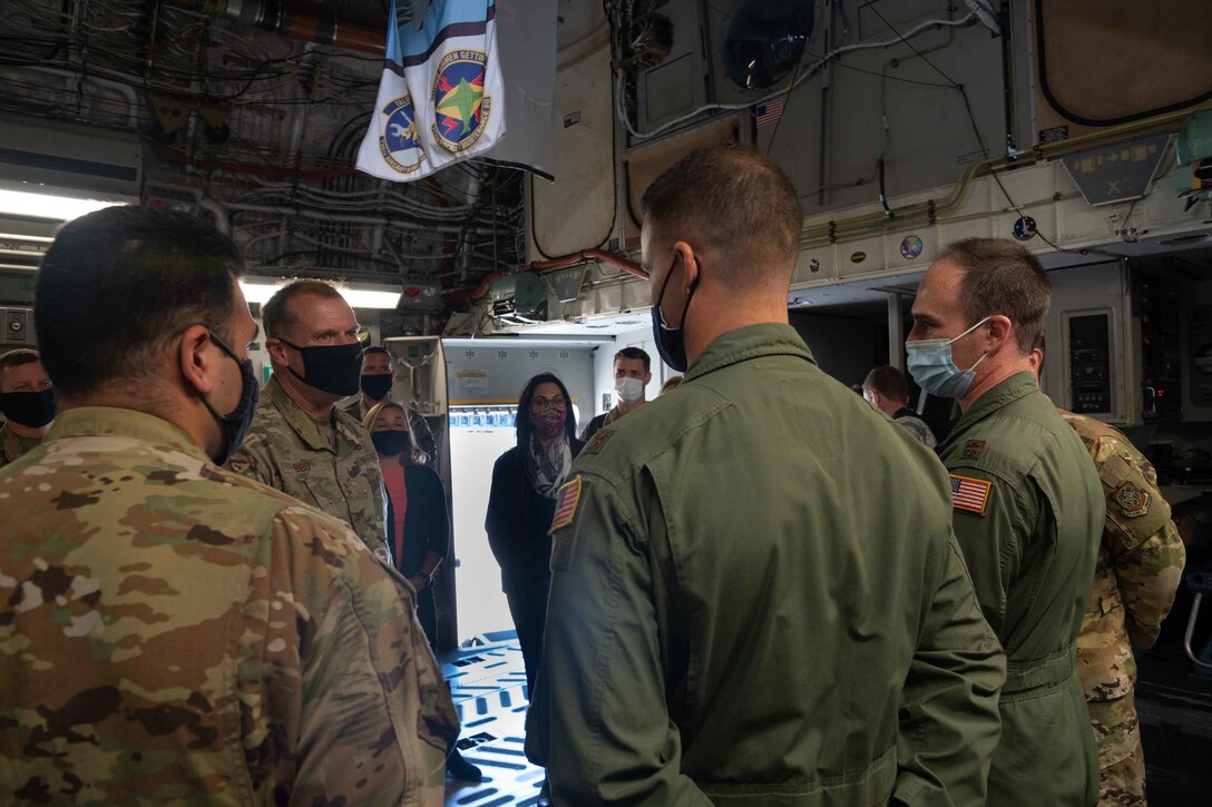 Crew members from the 3rd Airlift Squadron discuss the static C-17 Globemaster III with Maj. Gen. Thad Bibb, 18th Air Force commander, during a base visit Sept. 22, 2020, at Dover Air Force Base, Delaware. Bibb, who previously served as the commander of the 9th Airlift Squadron, returned to Dover AFB after ten years to learn about how Dover Airmen contribute to the 18th Air Force mission of warfighter readiness and sustainment. Bibb experienced firsthand Dover AFB’s diverse missions and toured new facilities, including the Tactics and Leadership Nexus and Bedrock Innovation Lab. (U.S. Air Force photo by Airman 1st Class Faith Schaefer)