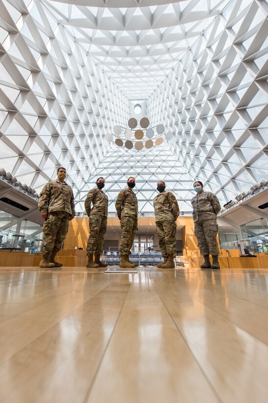 Five members of the Air Force Reserve mental health team who spent 54 days at the Air Force Academy helping cadets deal with the rigors of Academy life in this time of the COVID-19 pandemic pose for a photo. Left to right are Col. (Dr.) Mario Tommasi, Staff Sgt. Melissa Mendez, Col. Susan Beylotte, Lt. Col. Brande Newsome and Senior Airman Vivian Gaytan. (Trevor Cokley)