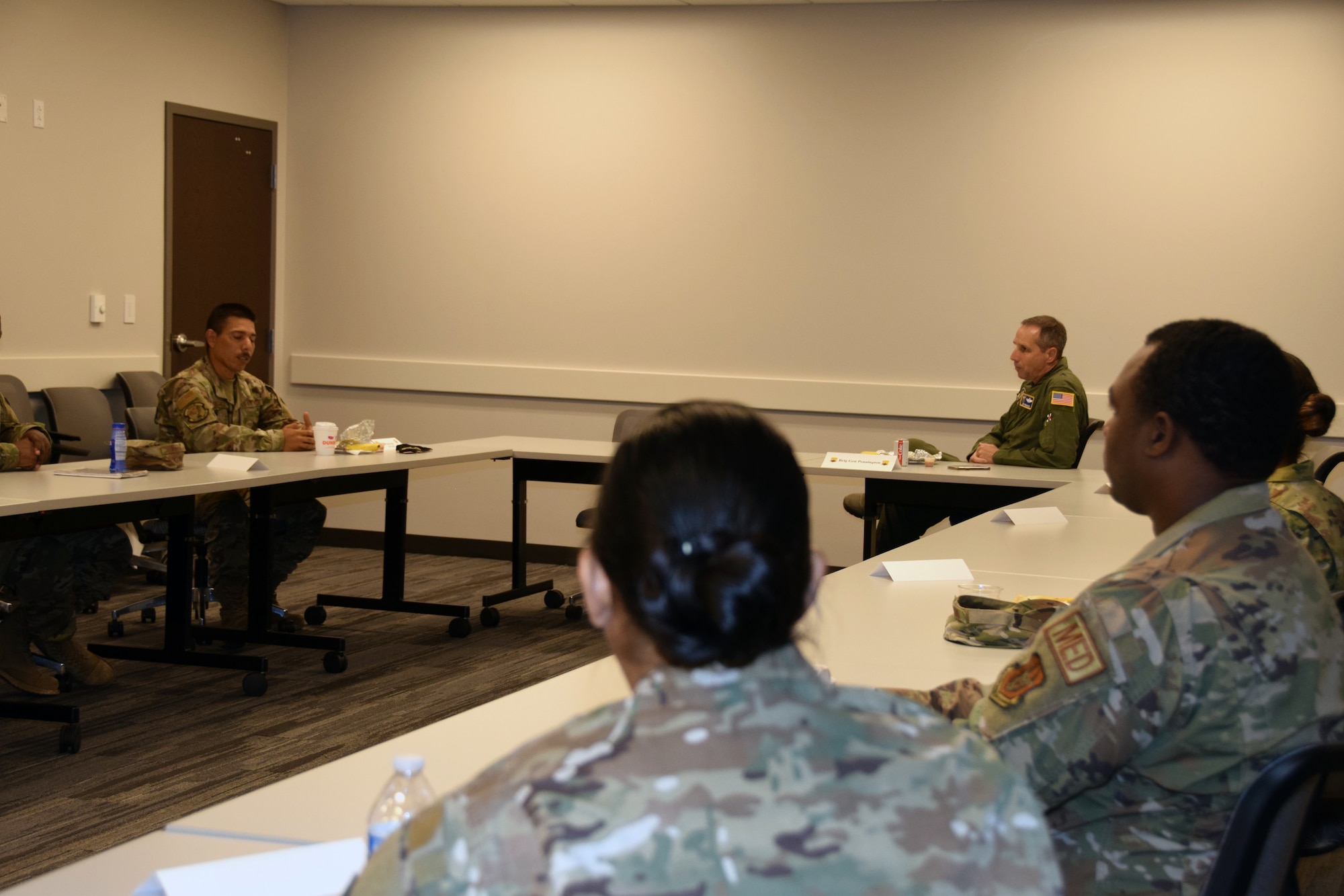 Brig. Gen. Jeffrey T. Pennington, 4th Air Force commander, meets with several 433rd Airlift Wing minority members to discuss racial diversity and inclusion in the unit during a tour of the wing Sept. 23, 2020 at Joint Base San Antonio-Lackland, Texas.