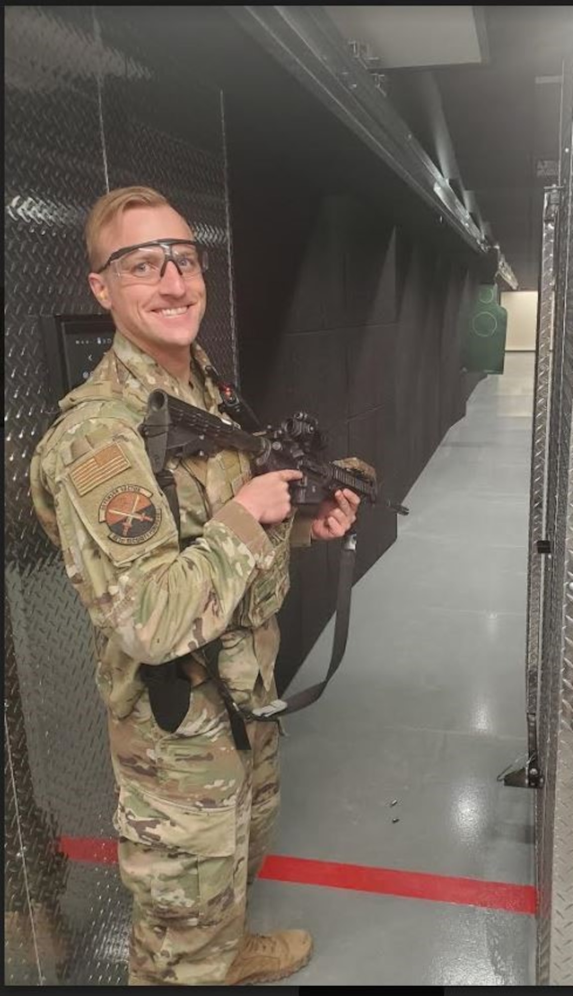 TSgt Krogh smiles after firing the first set of rounds on a firing range in Thule AB, Greenland