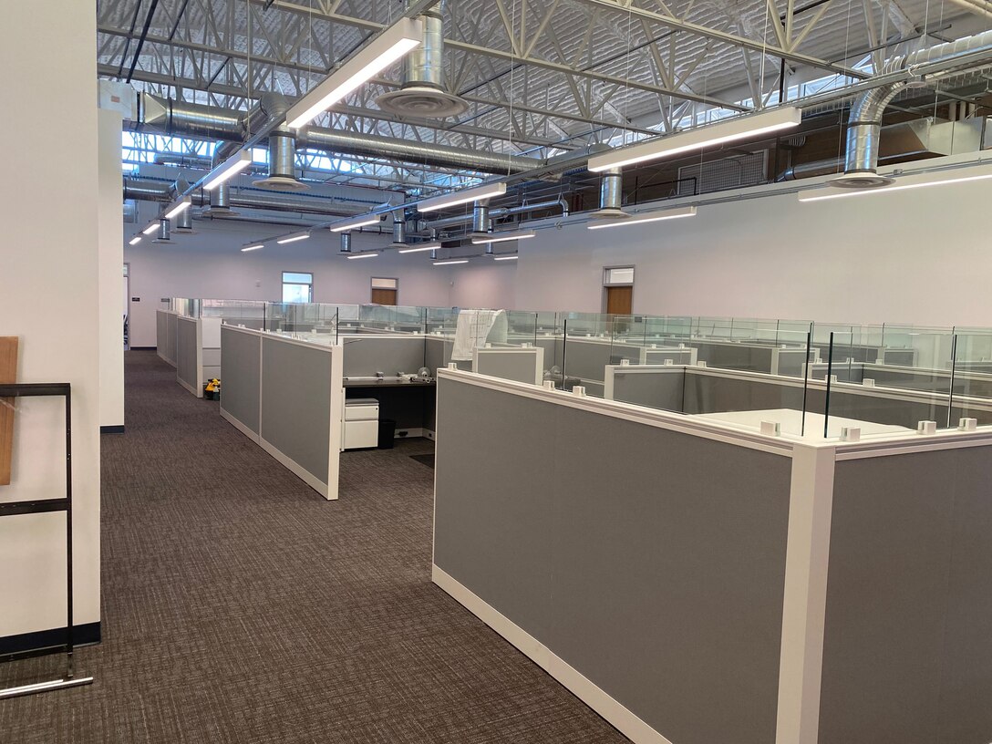 Renovated office space with new cubicles pictured.