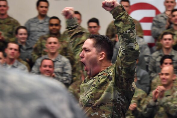 Then Senior Master Sgt. Michael Rozneck, 50th Operations Support Squadron superintendent, learns he earned the rank of chief master sergeant March 4, 2020, at Schriever Air Force Base, Colorado. Rozneck battled and beat stage two testicular cancer after undergoing emergency surgery and 23 rounds of chemo therapy. Through it all, he said he learned to appreciate the present and stop worrying about the past and future. (U.S. Air Force photo by Dennis Rogers)