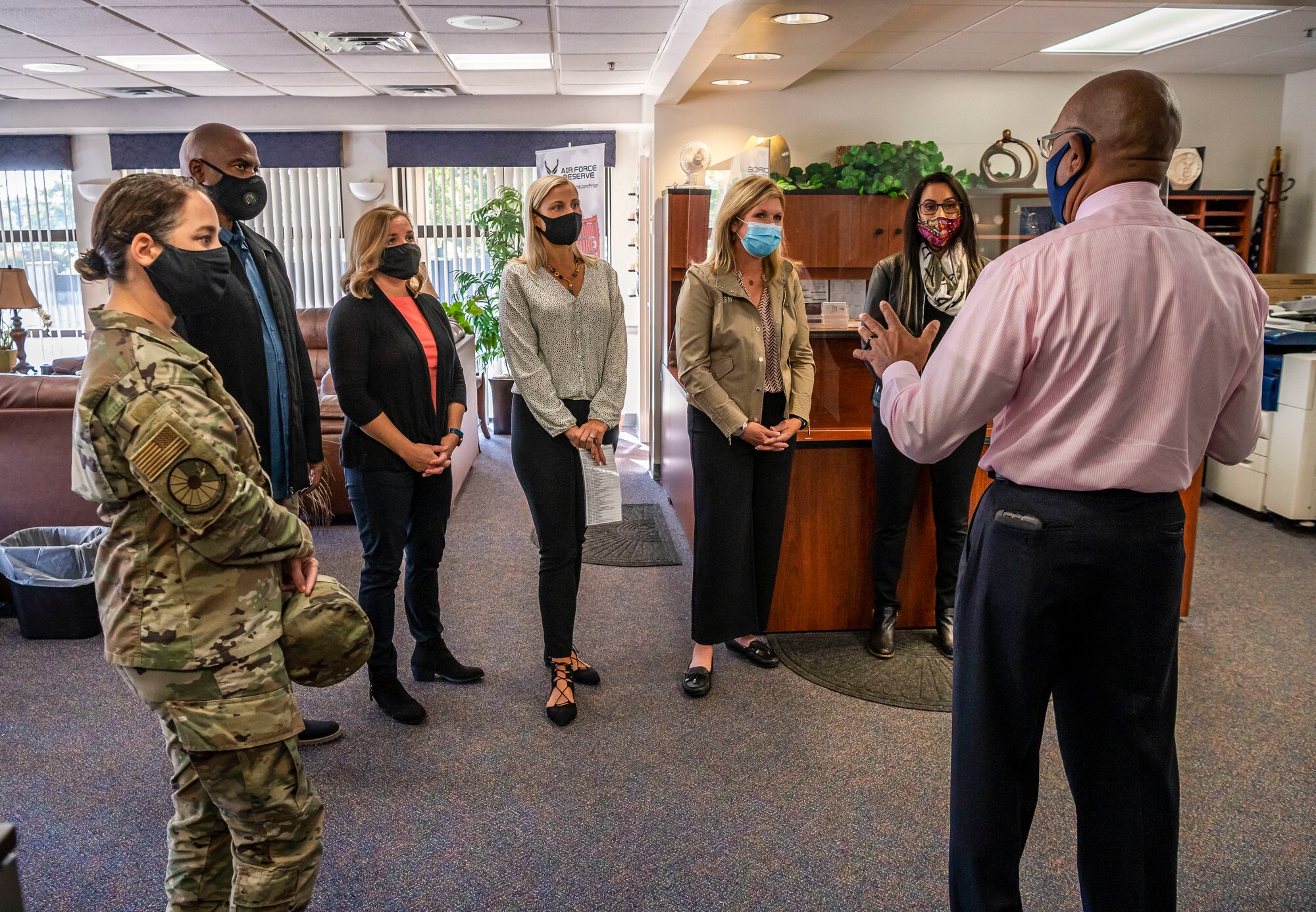 James Brown, 436th Force Support Squadron Airman and Family Readiness Center employment program manager, gives a brief to 18th Air Force spouses and 436th Airlift Wing spouses during their tour at Dover Air Force Base, Delaware, Sept. 22, 2020. Shannon Bibb, wife of 18th Air Force commander Maj. Gen. Thad Bibb, and retired Master Sgt. Trish Simpson, wife of 18th Air Force command chief Chief Master Sgt. Chris Simpson, toured Dover AFB to experience firsthand the diverse missions and units there.  (U.S. Air Force photo by Senior Airman Christopher Quail)
