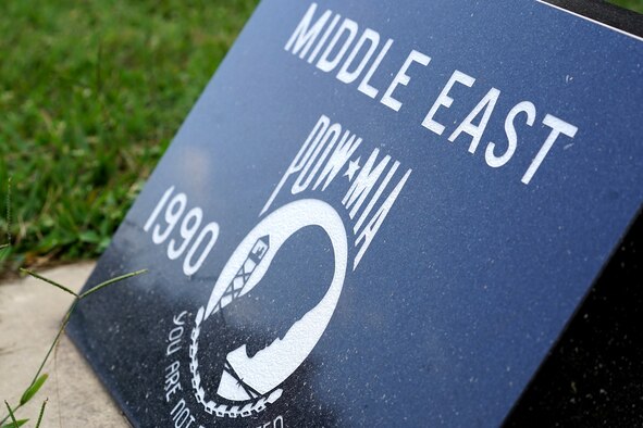 U.S. Air Force Staff Sgts. Chris Carr and Darrell Green, 81st Dental Squadron dental assistants, participate in Keesler's POW/MIA 12-hour memorial run and vigil on the Crotwell Track at Keesler Air Force Base, Mississippi, Sept. 18, 2020. This event is held annually to raise awareness and pay tribute to all prisoners of war and the military members still missing in action. (U.S. Air Force photo by Kemberly Groue)