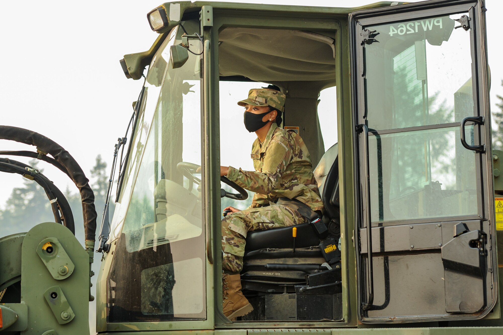 U.S. Air Force Senior Airman Jamie Boyd, a pest management apprentice assigned to the 446th Civil Engineer Squadron (CE), trains on the 10K All-Terrain Forklift on Sept. 11, 2020 at Joint Base Lewis-McChord, Washington.