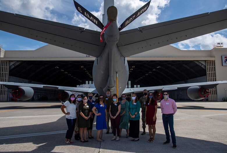 Team MacDill senior-leadership spouses stand next to a 6th Air Refueling Wing KC-135 Stratotanker aircraft during an immersion tour at MacDill Air Force Base, Florida, Sept. 24, 2020.