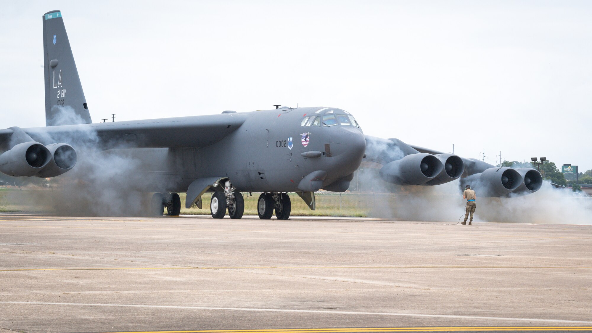 A 2nd Maintenance Groupcrew chief leads a B-52H Stratofortress as it is “cart started” during a readiness exercise at Barksdale Air Force Base, La., Sept. 25, 2020.