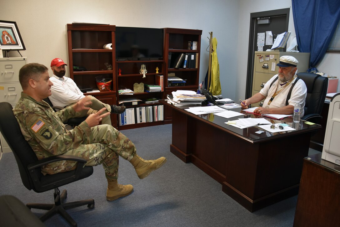 Col. Zach Miller and Local Government Liaison Andrew Auxier meet with Iowa, La., mayor Paul Hesse