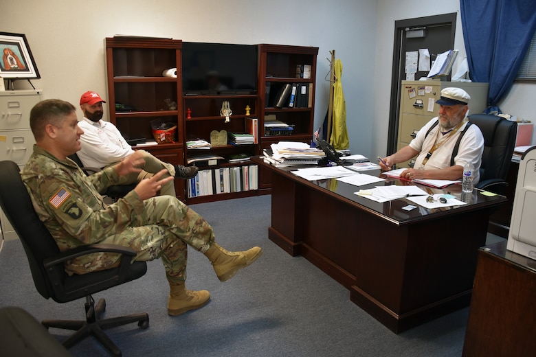 Col. Zach Miller and Local Government Liaison Andrew Auxier meet with Iowa, La., mayor Paul Hesse