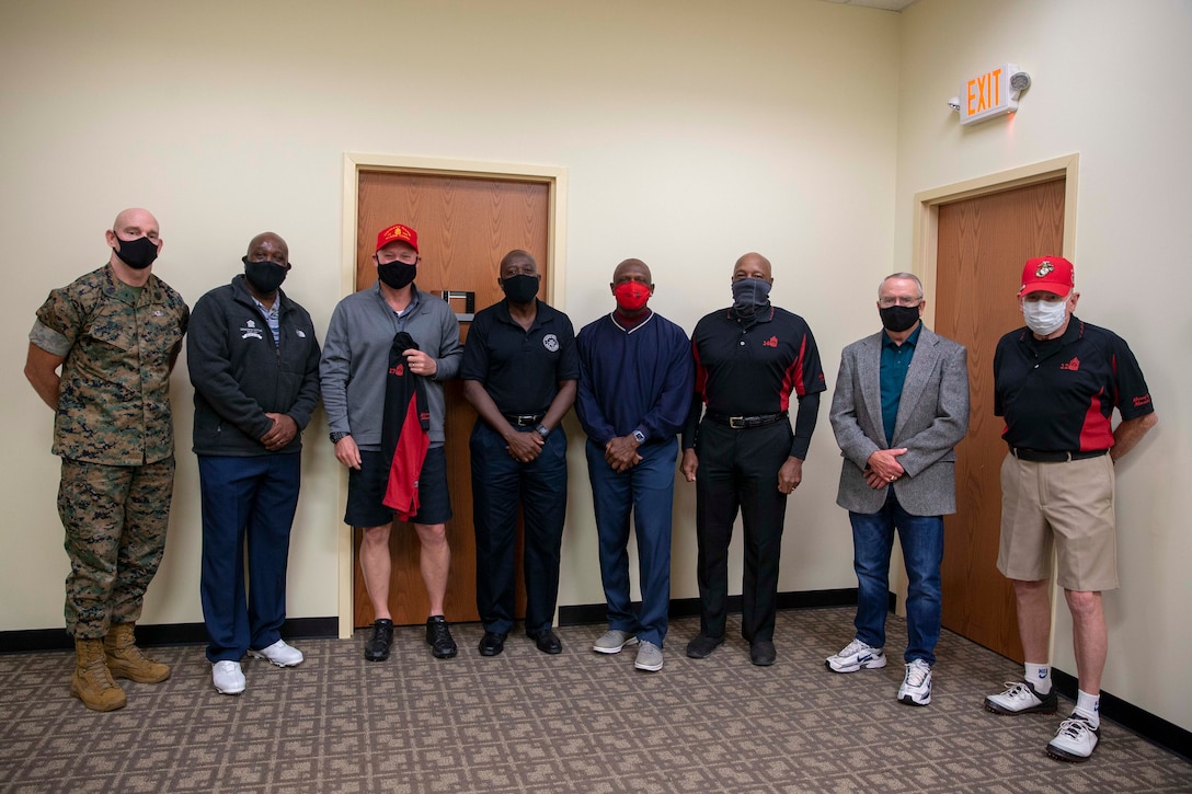 The 19th Sergeant Major of the Marine Corps, Sgt. Maj. Troy E. Black, poses for a photo with previous sergeants major of the Marine Corps at a charity event held at Marine Corps Base Quantico, Sept. 21, 2020. The event was held at the Medal of Honor golf course. The day allowed Marines active duty and veteran to interact over a round of golf. (U.S. Marine Corps photo by Sgt. Victoria Ross)