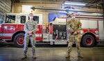 Staff Sgts. Joshua Prater and Michael Mauldin, in fire protection with the 179th Airlift Wing, stopped on their way to work Sept. 16, 2020, to provide lifesaving first aid to the victim of a motor vehicle accident. They were coined by Brig. Gen. James R. Camp Sept. 27 at the 179th Airlift Wing, Mansfield, Ohio.