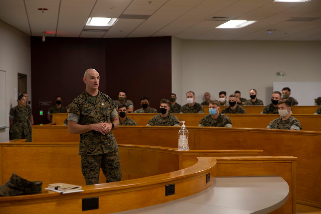 The 19th Sergeant Major of the Marine Corps, Sgt. Maj. Troy E. Black speaks to Marines attending Sergeant School at the Staff Non Commissioned Officer Academy at Marine Corps Base Camp Johnson, Jacksonville, N.C., Sept. 17, 2020. The visit allowed Sgt. Maj. Black to address Marines during their required Professional Military Education per their grade about leadership and the responsibilities and abilities of the NCO rank. The College of Enlisted Military Education provides a continuum of education to improve leadership, sharpen critical and creative thinking skills, and deepen Marines' understanding of warfighting concepts in distributed and joint environments in order to foster ethical, professional leaders who make sound decisions in complex operational situations. (U.S. Marine Corps photo by Sgt. Victoria Ross)