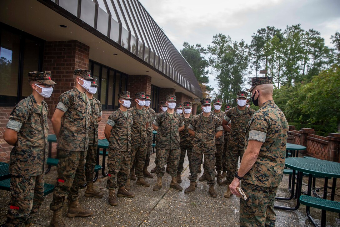The 19th Sergeant Major of the Marine Corps, Sgt. Maj. Troy E. Black speaks to Marines attending the Landing Support Specialist Course at Marine Corps Combat Service Support School (MCCSSS) at Marine Corps Base Camp Johnson, Jacksonville, N.C., Sept. 17, 2020. During the visit Sgt. Maj. Black discussed the importance of sustaining the transformation as Marines prepare to graduate from their entry level school. MCCSSS develops, conducts and evaluates formal training for entry, intermediate and advanced level officer, enlisted and civilian students in Personnel Administration, Ground Supply Support and Distribution, Financial Management and Logistics Operations, as well as Marine Corps Water Survival training. (U.S. Marine Corps photo by Sgt. Victoria Ross)