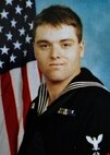 Portrait of Hull Maintenance Technician 3rd Class Kenneith E. Clodfelter.