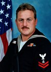 Portrait of Electronic Warfare Technician 2nd Class Kevin S. Rux.