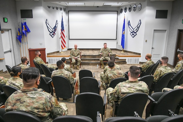 Lt. Gen. Gene Kirkland (right), Air Force Sustainment Center commander, and Chief Master Sgt. David Flosi, AFSC command chief master sergeant, visit with Airmen