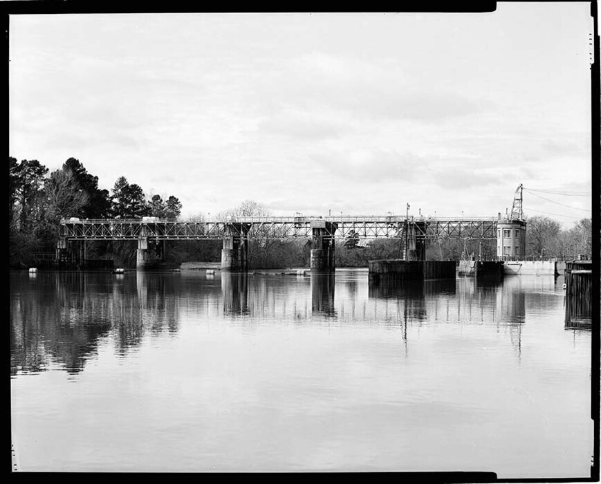 Overall view of lock and dam from upstream, facing west, 2020.