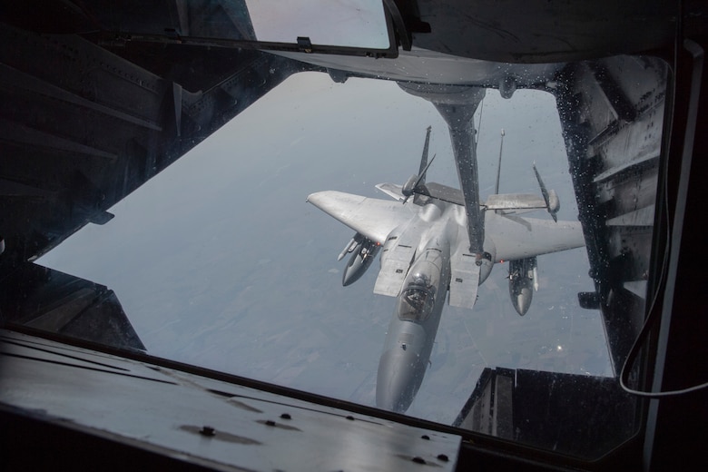A U.S. Air Force KC-10 Extender refuels a U.S. Air Force F-15C Eagle over Poland, Sept. 22, 2020. The F-15s, based out of RAF Lakenheath, participated in exercise Astral Knight along with fighter aircraft from Spangdahlem Air Base, Poland and other members of NATO. (U.S. Air Force photo by Airman 1st Class Alison Stewart)