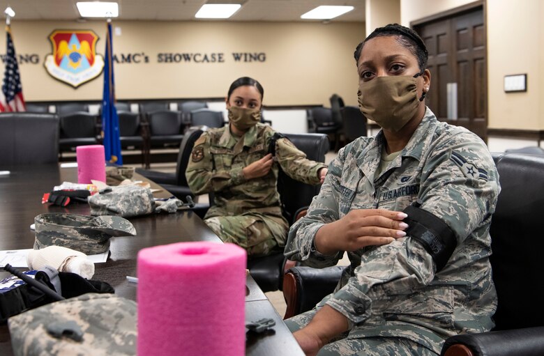 Airmen learn how to use tourniquets.