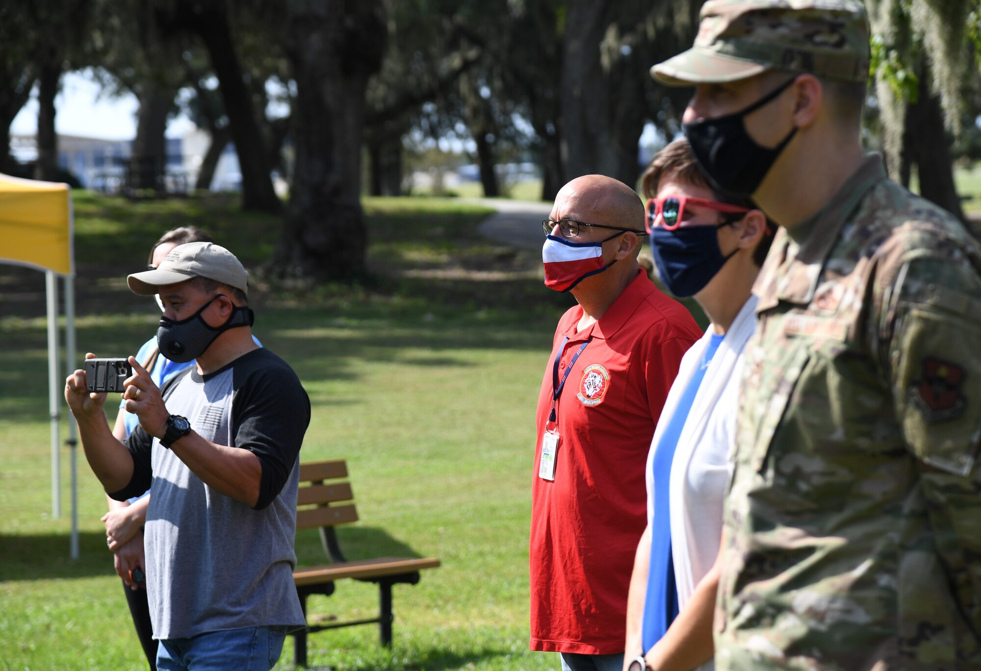 Keesler personnel attend the Butterfly Release Ceremony honoring Keesler's Fallen Heroes at the Marina at Keesler Air Force Base, Mississippi, Sept. 25, 2020. The event was held in conclusion of Gold Star Family Remembrance Week, which honored the families of fallen service members. (U.S. Air Force photo by Kemberly Groue)