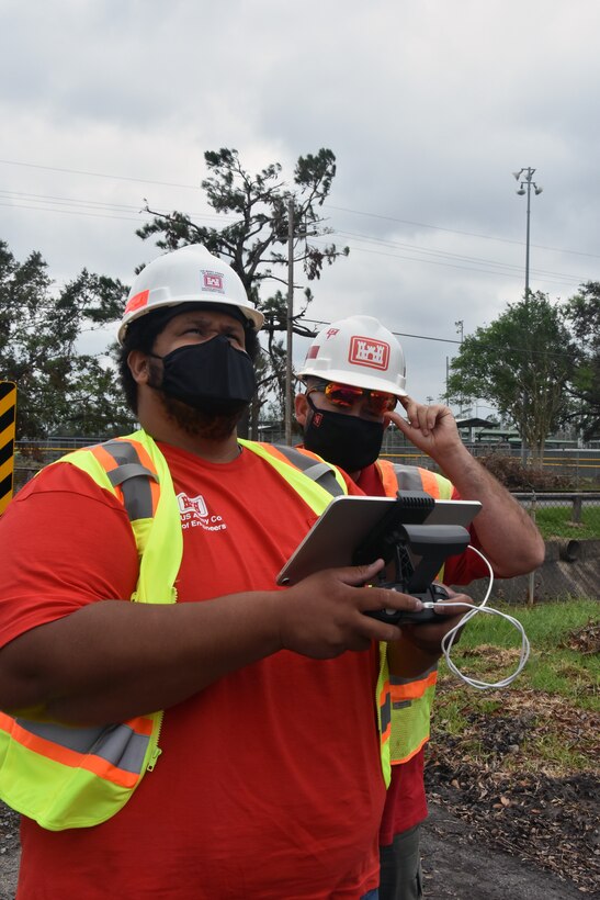 Charles McKenzie, left, and Michael Baker operate a drone in Sulpher, La., on Sept. 20, 2020, in support of Operation Blue Roof in the aftermath of Hurricane Laura, a Category 4 storm that slammed the Louisiana coast on Aug. 27, 2020. Unmanned aerial systems operators from the U.S. Army Corps of Engineers Research and Development Center, headquartered in Vicksburg, Mississippi, use drones to help assess homes and determine eligibility for the Blue Roof program. The team also uses the aerial imagery to verify that plastic sheeting was installed per contract specifications.
