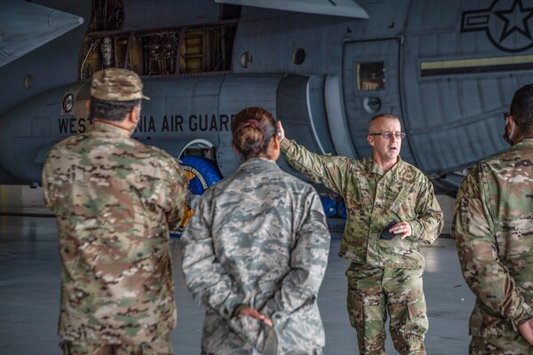 Col. Patrick Chard, the 130th Airlift Wing Vice Commander, explains the 130th Maintenance Group’s mission to members of the West Virginia National Guard’s (WVNG) State Partnership Program (SPP) counterparts on Sept. 24, 2020 at McLaughlin Air National Guard Base, Charleston, W.Va. The West Virginia/Peru SPP was formalized in 1996 and has generated more than 120 interactions between the forces. (U.S. Air National Guard Photo by Staff Sgt. Caleb Vance)