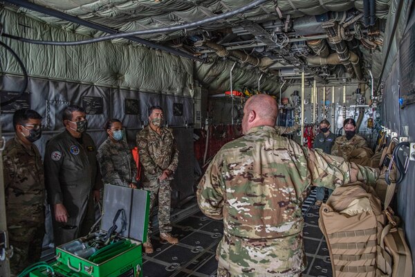 Members of the 167th Aeromedical Evacuation Squadron explain their mission and capabilities to members of the West Virginia National Guard’s (WVNG) State Partnership Program (SPP) counterparts on Sept. 24, 2020 at McLaughlin Air National Guard Base, Charleston, W.Va. The West Virginia/Peru SPP was formalized in 1996 and has generated more than 120 interactions between the forces. (U.S. Air National Guard Photo by Staff Sgt. Caleb Vance)