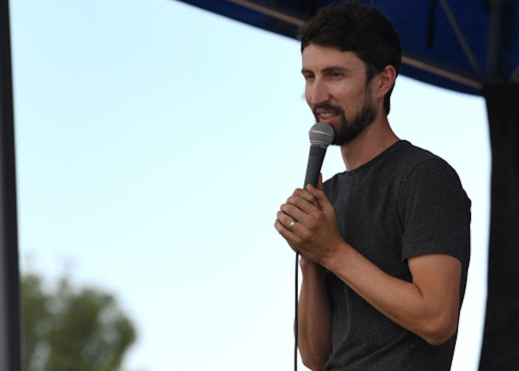 Comedian David Rodriguez, performs for Buckley Connects Day at Buckley Air Force Base, Colo., Sept. 25, 2020. Buckley Connects Day involved a variety of events including live virtual discussions covering a range of topics, a drive-in comedy show and a drive-in movie. (U.S. Space Force photo by Airman 1st Class Haley N. Blevins)