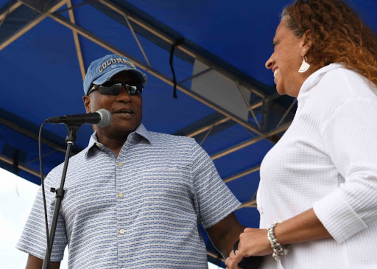 Col. Devin Pepper, Buckley Garrison commander, and his wife, Alicia Pepper, provide opening remarks prior to the stand up comedy show for Buckley Connects Day at Buckley Air Force Base, Colo., Sept. 25, 2020. Team buckley members used this time to wind down after tough conversation during Buckley Connects Day. (U.S. Space Force photo by Airman 1st Class Andrew Garavito)