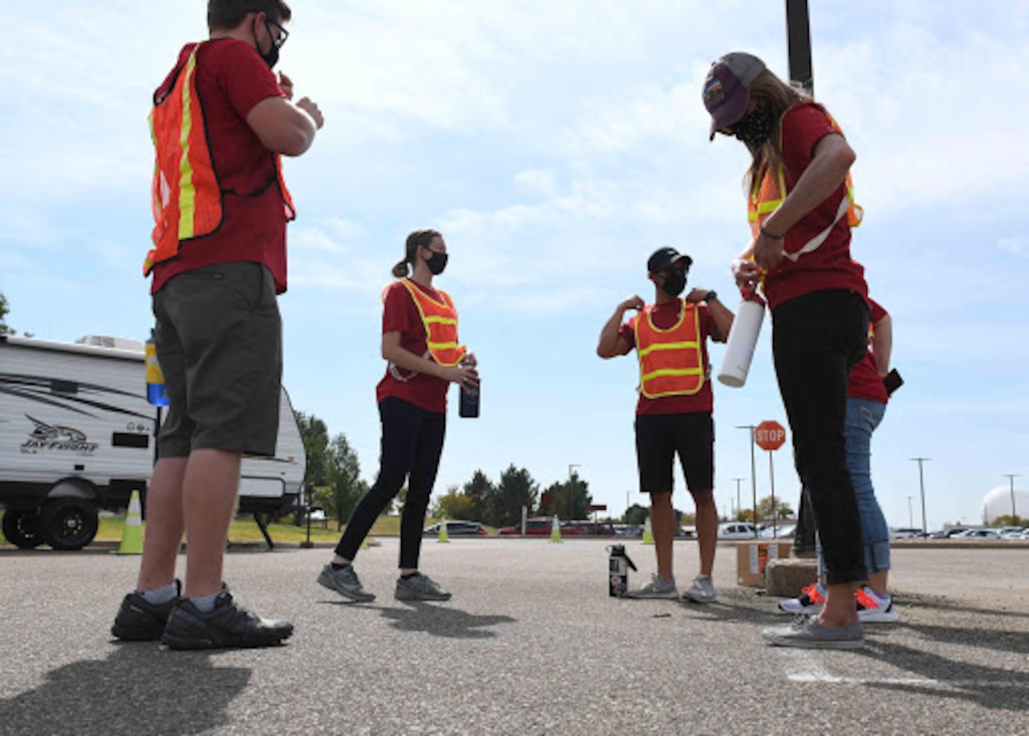 Event staff meet to discuss logistics for Buckley Connects Day at Buckley Air Force Base, Colo., Sept. 25, 2020. The stand up comedy event featured Comedians Mike Paramore and David Rodriguez.  (U.S. Space Force photo by Airman 1st Class Andrew Garavito)