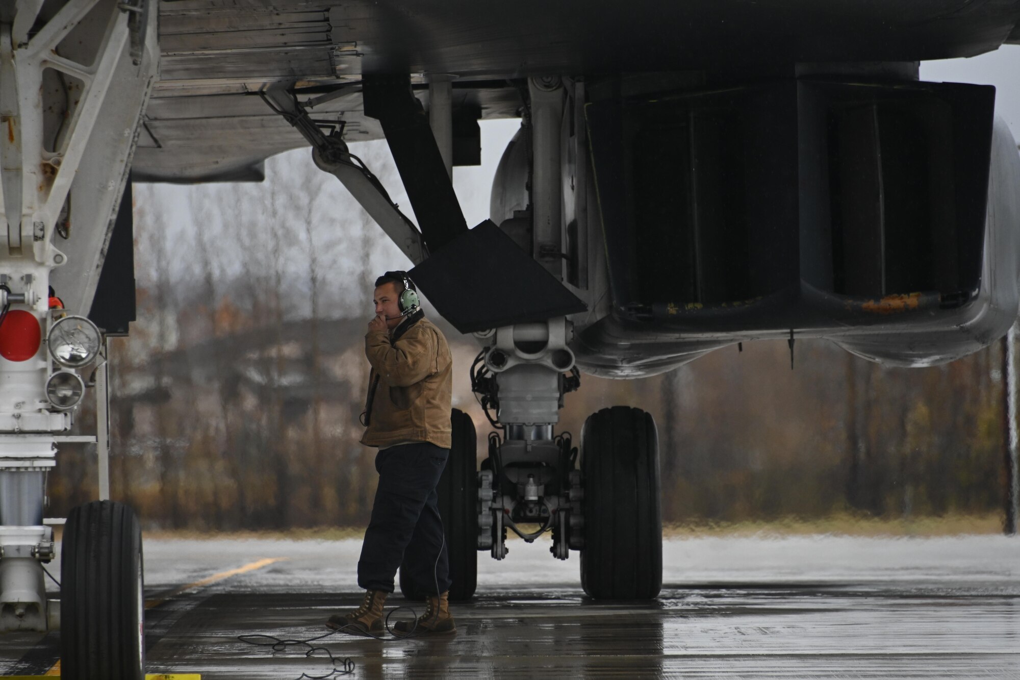 Photo of Airman standing by a B-1 Lancer