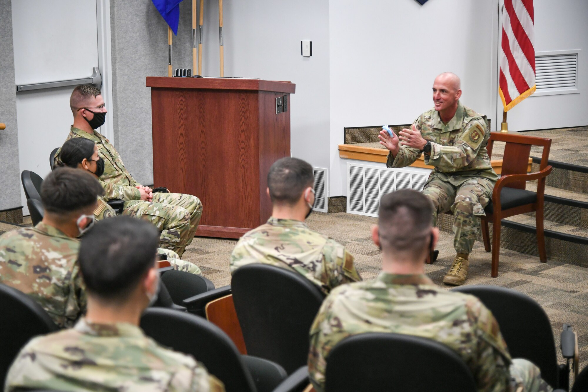 Chief Master Sgt. David Flosi, Air Force Sustainment Center commander chief master sergeant, visits with Airmen