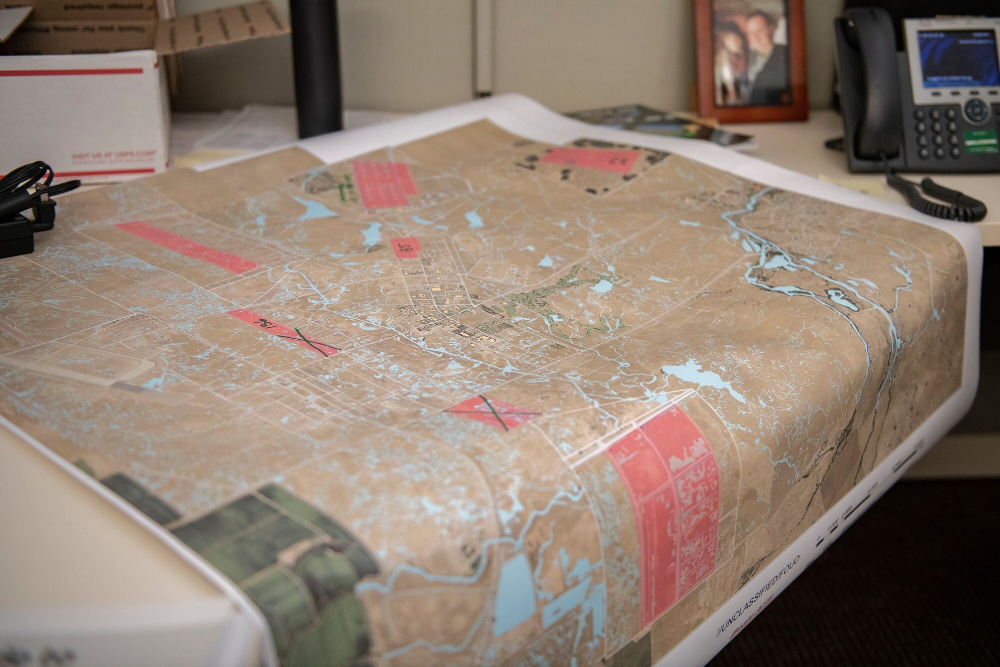 A map sits on the desk of Tech. Sgt. Kevin Cuningham, 9th Civil Engineer Squadron noncommissioned officer in charge of Execution Support, on Beale Air Force Base.