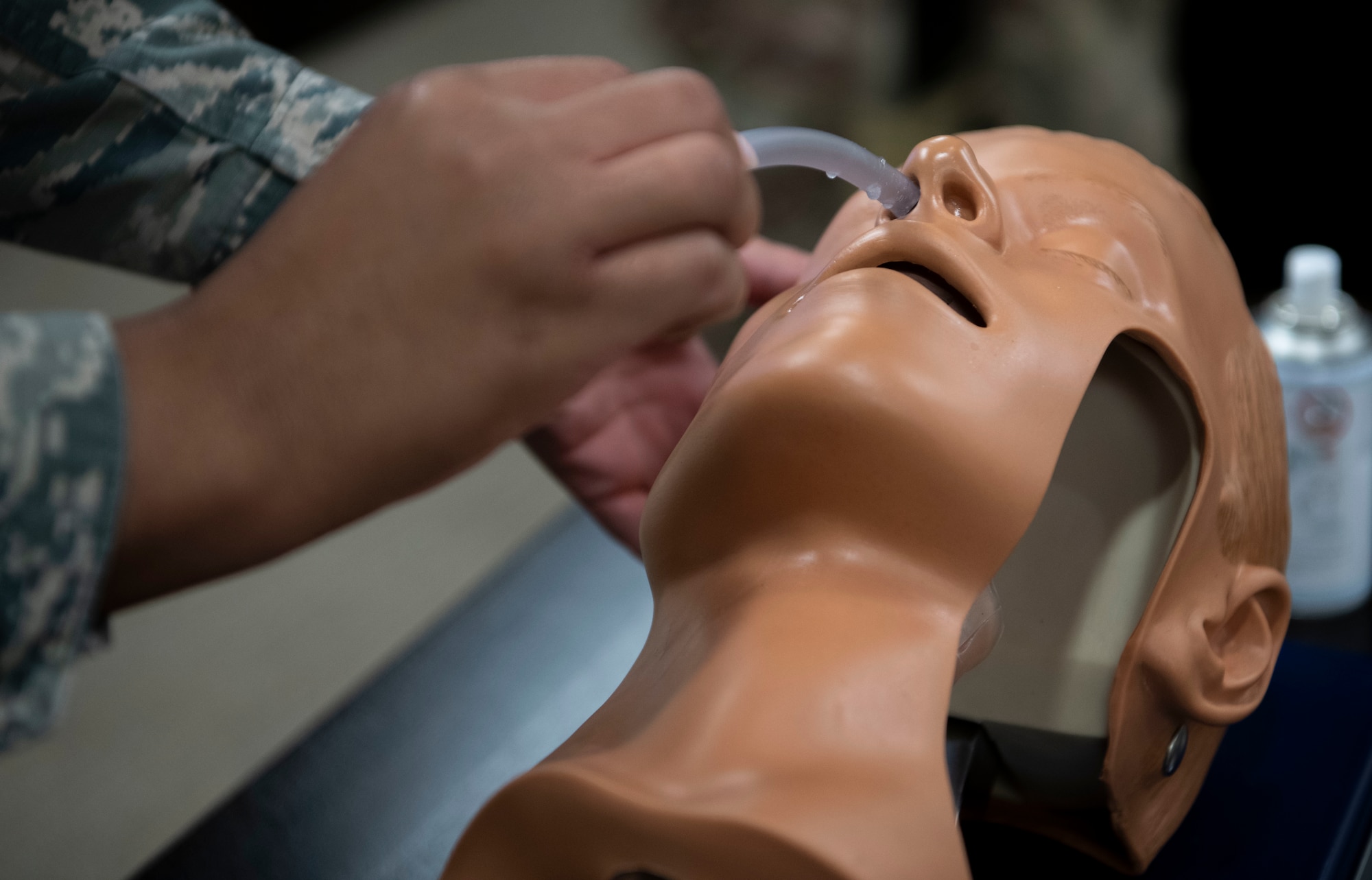 Airmen learn how to use a nasopharyngeal tube.