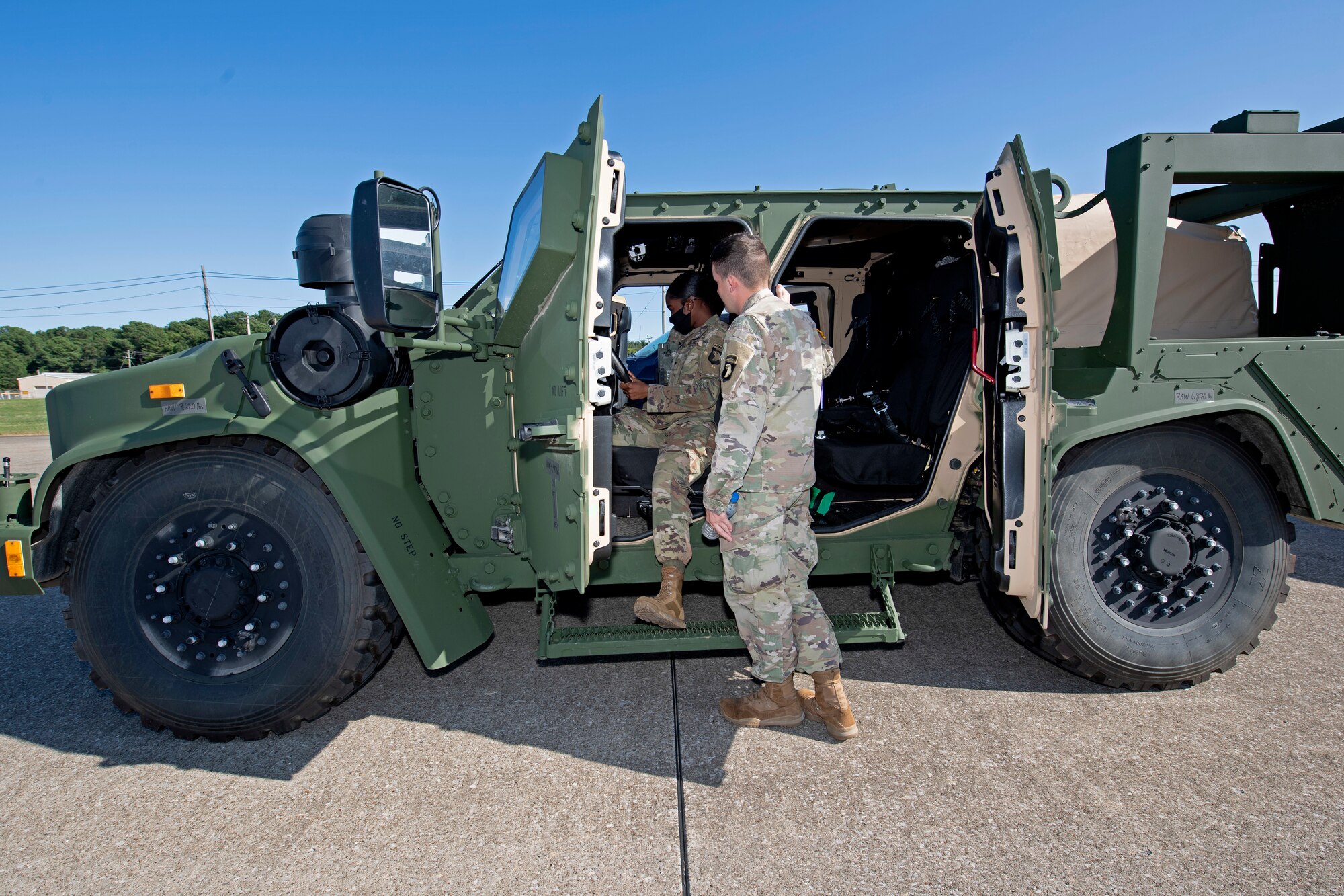 U.S. Airmen and Soldiers train together to load a Chinook-47 into a C-5M Super Galaxy