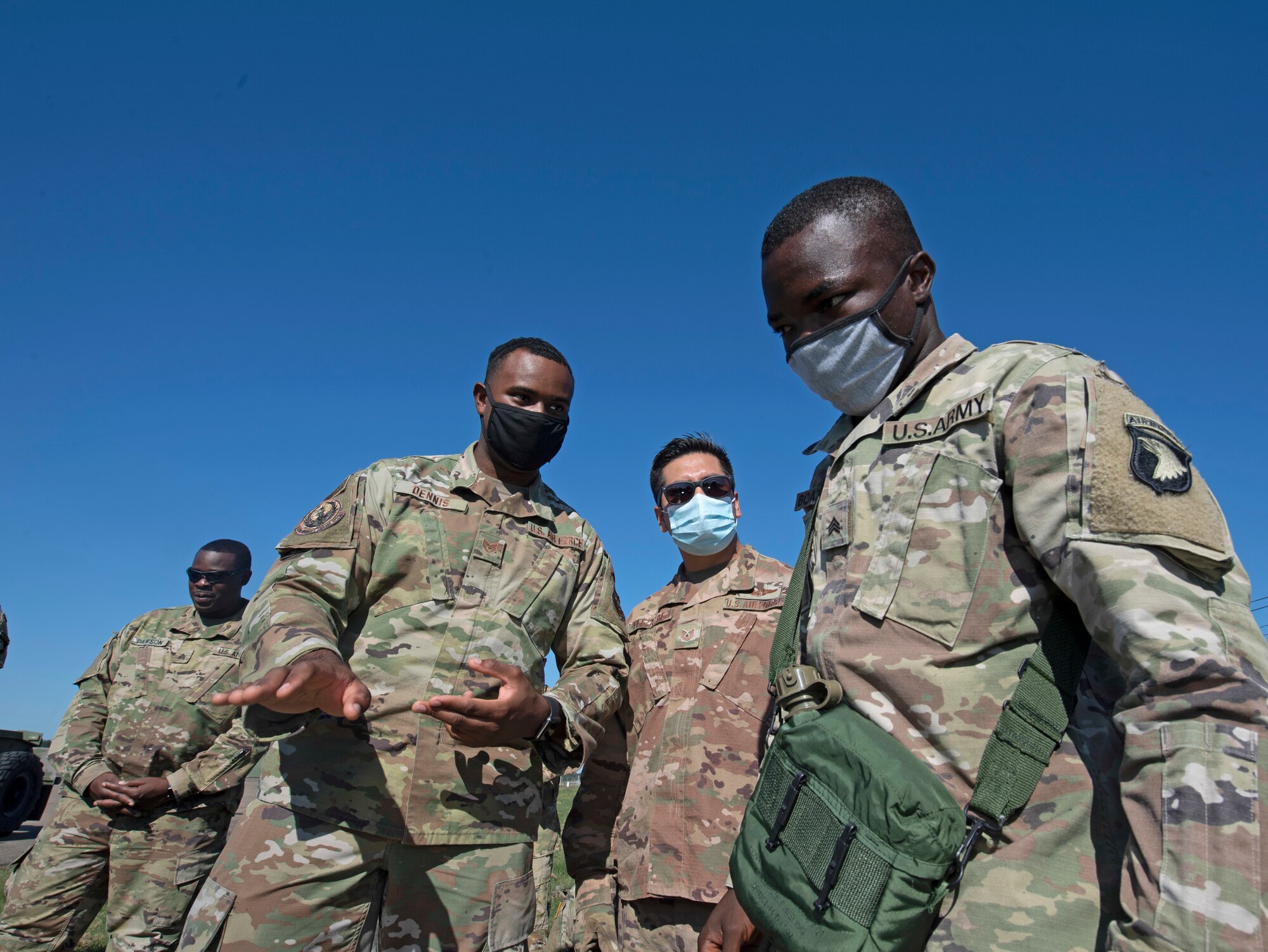 U.S. Airmen and Soldiers train together to load a Chinook-47 into a C-5M Super Galaxy