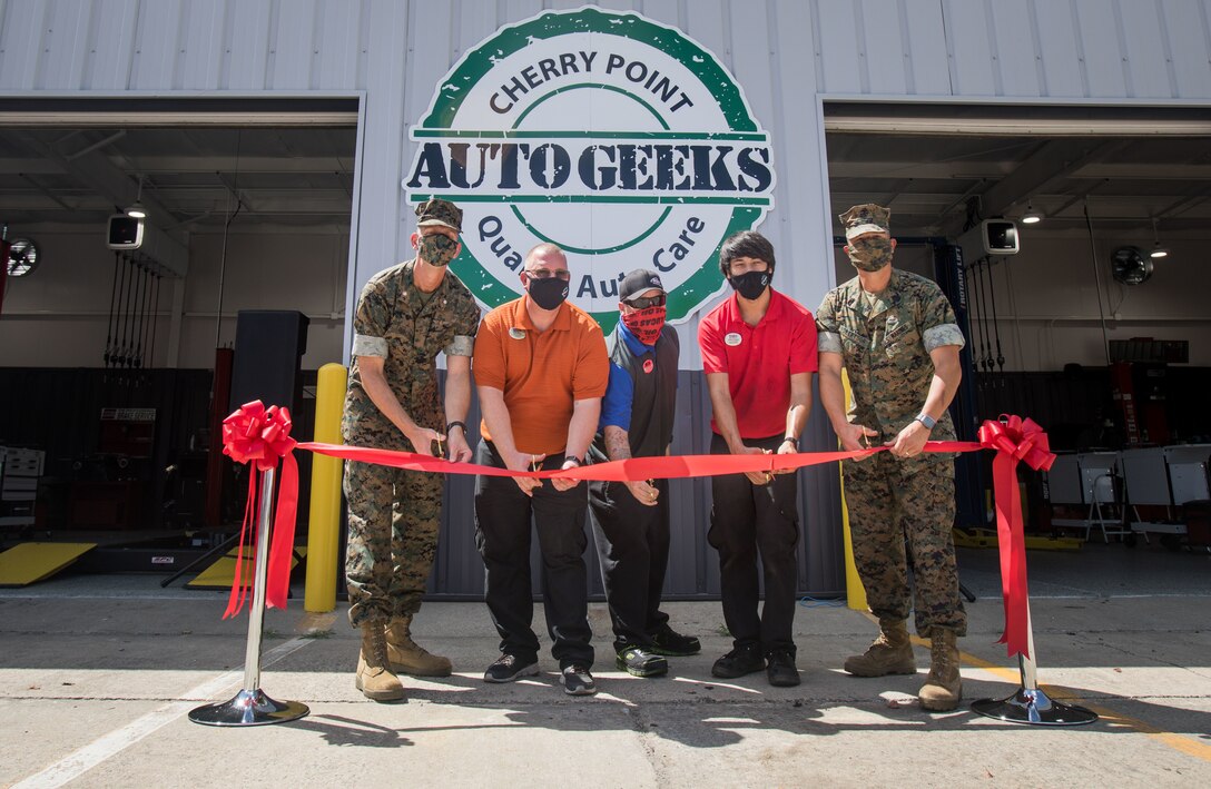 The Marine Corps Community Services held a grand opening for the new “AutoGeeks” center on Marine Corps Air Station Cherry Point, North Carolina, Aug. 8, 2020. Multiple events are scheduled for the center’s grand opening Aug. 6- 8. Thursday, Aug. 6 is Gearhead day, which includes a ribbon-cutting ceremony and automotive maintenance demonstrations. Friday, Aug. 7 is Car Care day, which includes multiple car care demonstrations from companies such as Meguiars, Rain X, and Mother’s. A car show will take place beginning at 11 a.m., Saturday, Aug. 8. It will include prize giveaways, and trophies will be awarded for different classes of vehicles. (U.S. Marine Corps photo by Cpl. Micha Pierce)
