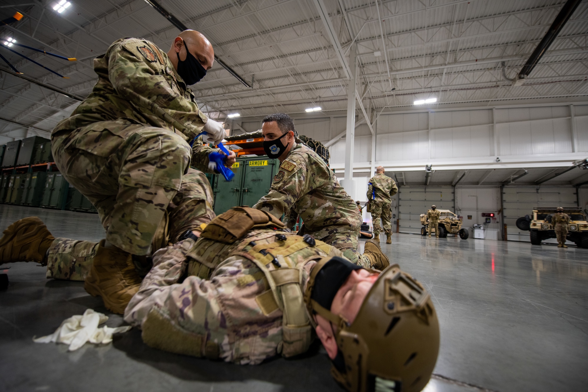 Image of U.S. Air Force Chief Master Sgt. Brian Kruzelnick, Air Mobility Command command chief, right, and Tech. Sgt. Giacomo Zignago, 571st Mobility Support Advisory Squadron independent duty medical tech senior adviser.