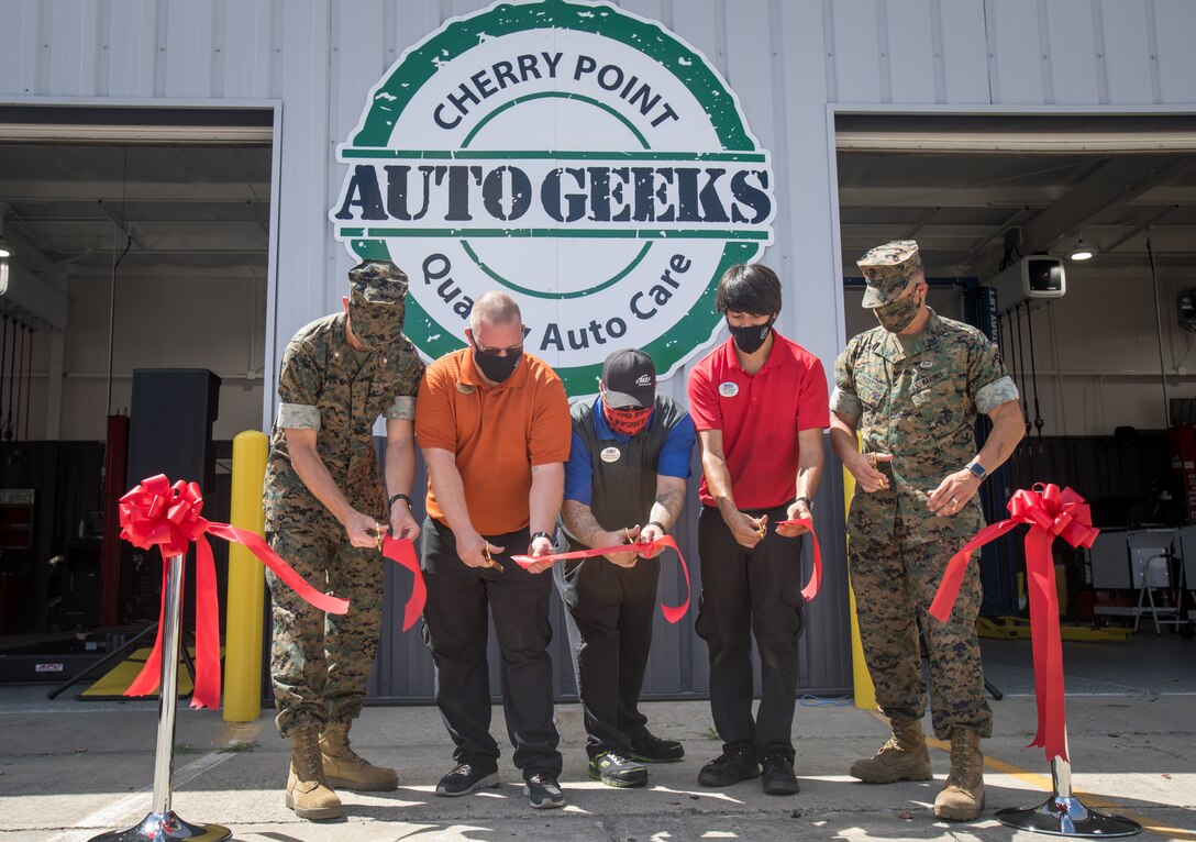 The Marine Corps Community Services held a grand opening for the new “AutoGeeks” center on Marine Corps Air Station Cherry Point, North Carolina, Aug. 8, 2020. Multiple events are scheduled for the center’s grand opening Aug. 6- 8. Thursday, Aug. 6 is Gearhead day, which includes a ribbon-cutting ceremony and automotive maintenance demonstrations. Friday, Aug. 7 is Car Care day, which includes multiple car care demonstrations from companies such as Meguiars, Rain X, and Mother’s. A car show will take place beginning at 11 a.m., Saturday, Aug. 8. It will include prize giveaways, and trophies will be awarded for different classes of vehicles. (U.S. Marine Corps photo by Cpl. Micha Pierce)