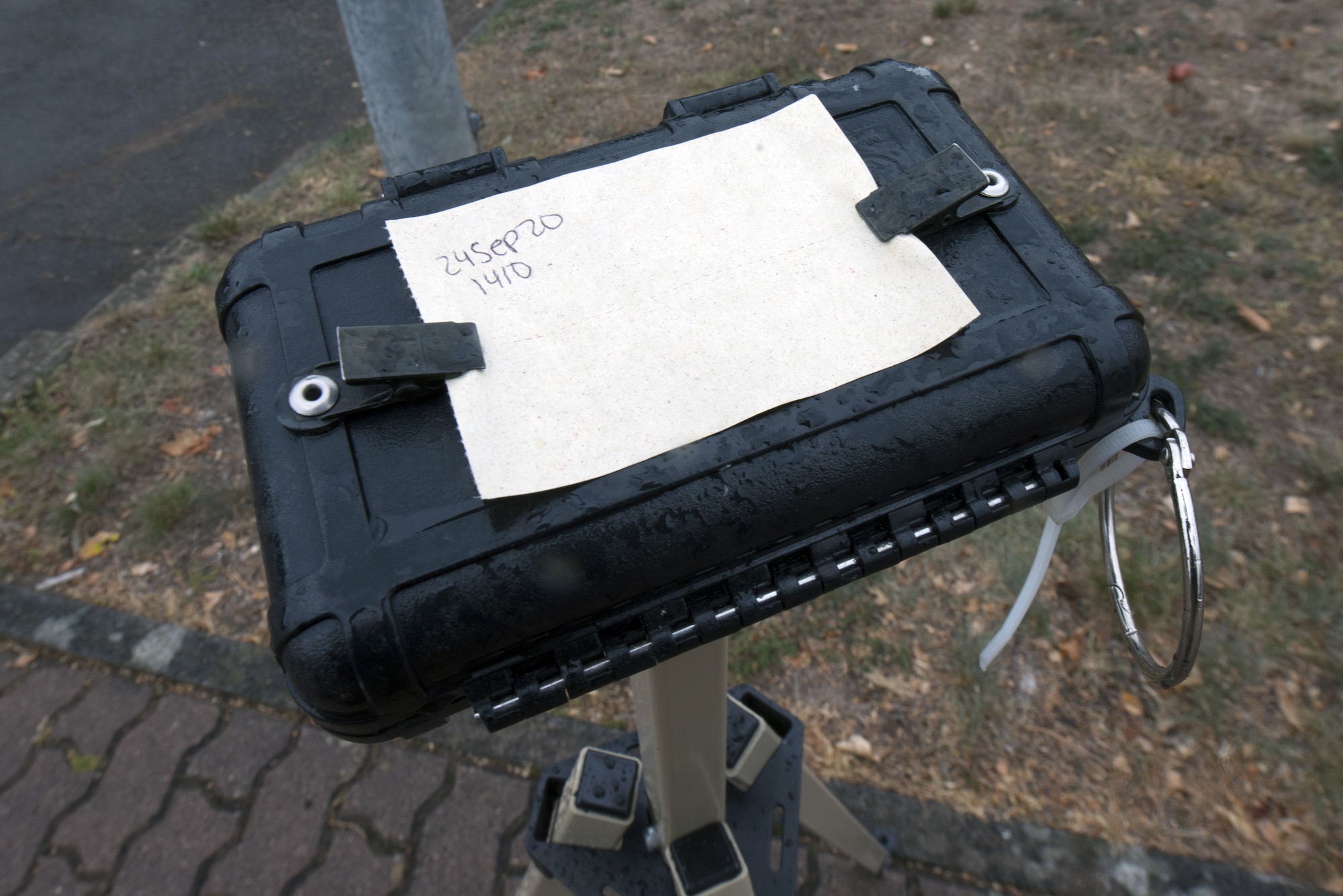 A portion of M8 chemical agent detector paper is placed on top of a stanchion on Ramstein Air Base, Germany, Sept. 24, 2020.