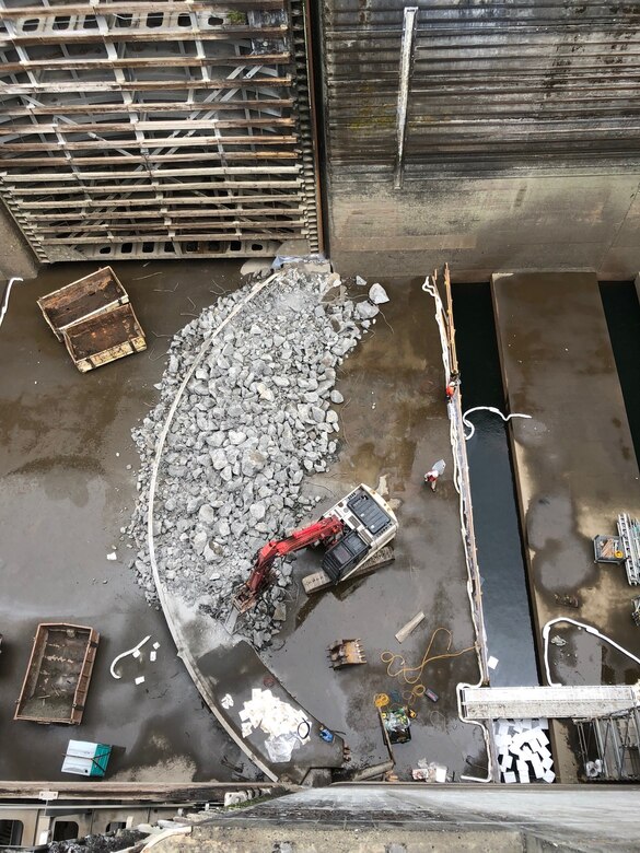 A look inside the the cracks and damage to the concrete sill exposed and broken rebar inside the navigation lock's concrete.