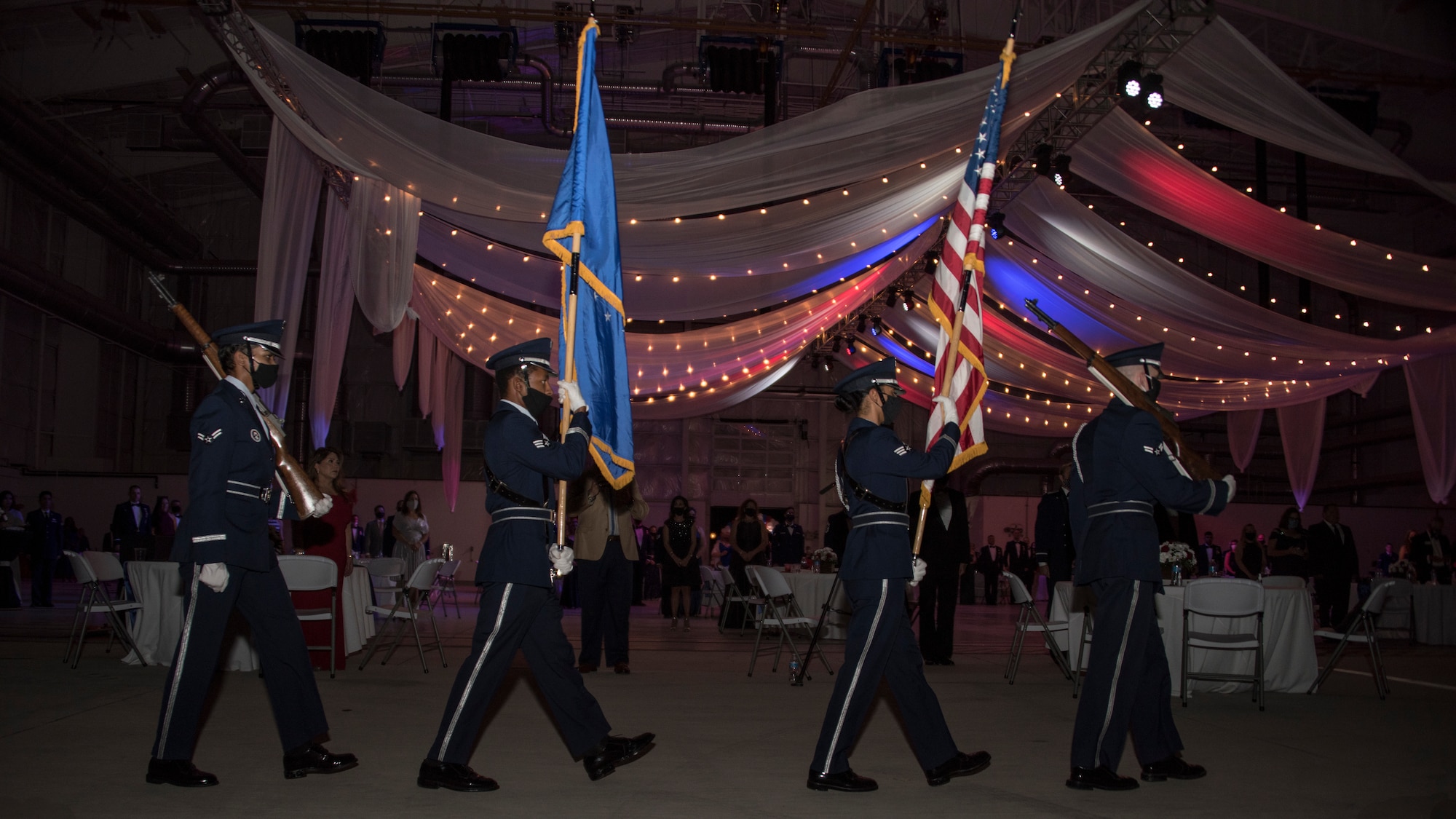 A photo of honor guard marching