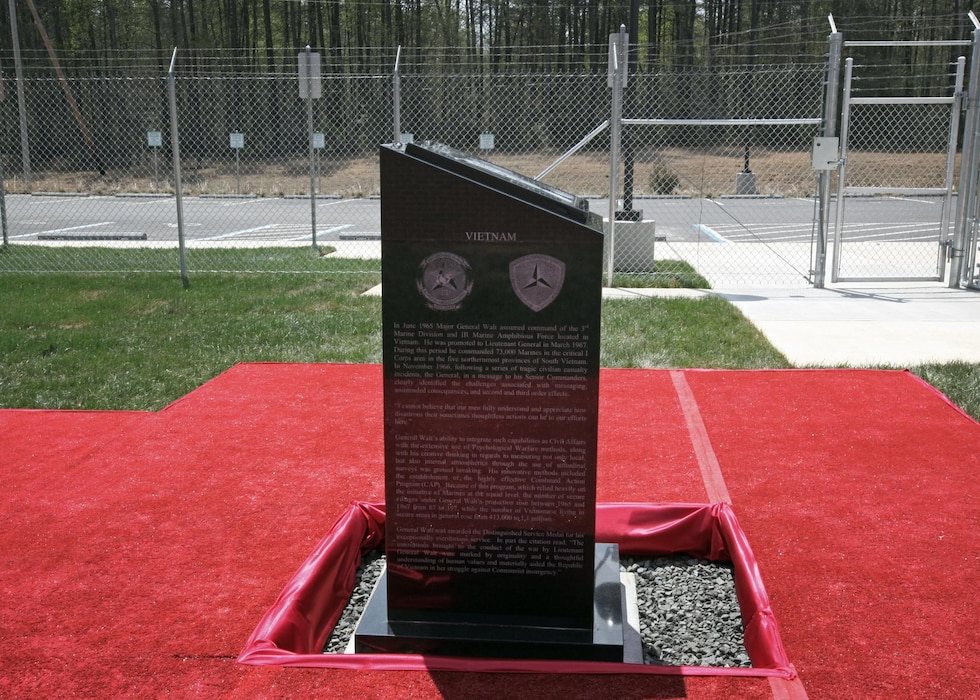 The Marine Corps Information Operations Center (MCIOC) dedicates it's new building, Walt Hall, to General Lewis W. Walt on  April 19, 2013 at Marine Corps Base Quantico, Quantico, Va. Gen. Walt was designated in 1968 as the first four-star Assistant Commandant of the Marine Corps and is recognized as a pioneer in Marine Corps information operations. (Official U.S. Marine Corps photo by Sgt. Kristofer Atkinson/Released)