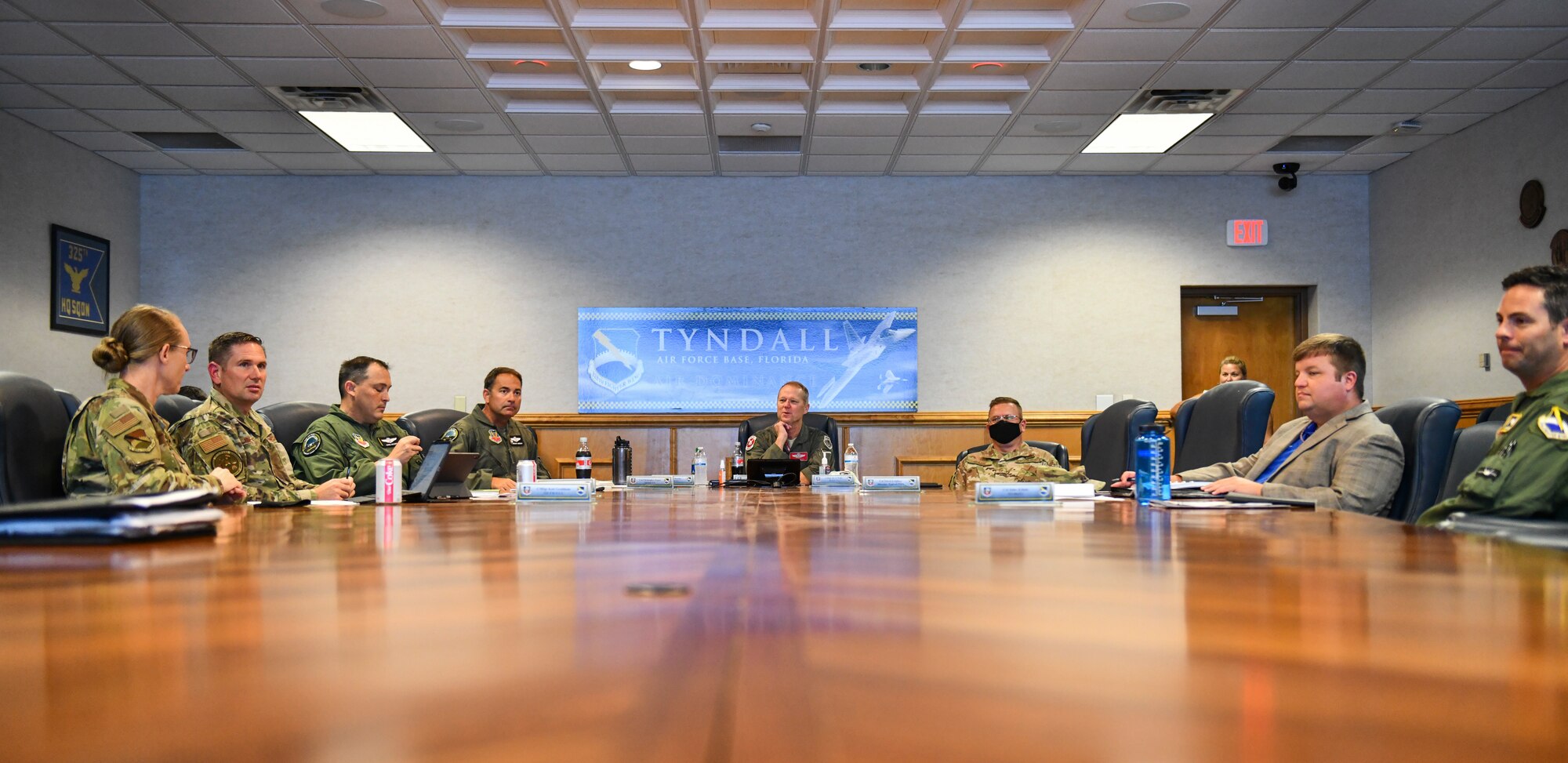 U.S. Air Force Gen. Mark Kelly (center), commander of Air Combat Command, and 325th Fighter Wing leadership converse before a briefing at Tyndall Air Force Base, Florida, Sept. 28, 2020. Kelly was briefed on Tyndall’s master plan for the rebuild before going on a tour of the base to see some of the facilities that have been renovated. (U.S. Air Force photo by Senior Airman Stefan Alvarez)