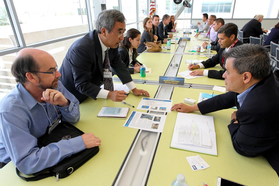 160615-N-HW977-633 NORCO, Calif. (June 15, 2016) Don Woods, seated left, and Don Akamine, representing Technology Service Corporation, meet with Bryan Chun, Naval Surface Warfare Center (NSWC), Corona Division Range Systems Engineering Department engineer, during Industry Partnership Forum at Norco College. The event, organized in cooperation with Riverside Community College District Procurement Assistance Center, included a forecast of NSWC Corona future contracting/subcontracting opportunities as well as a series of meet-and-greet sessions for suppliers to network with technical department personnel. (U.S. Navy photo by Greg Vojtko/Released)