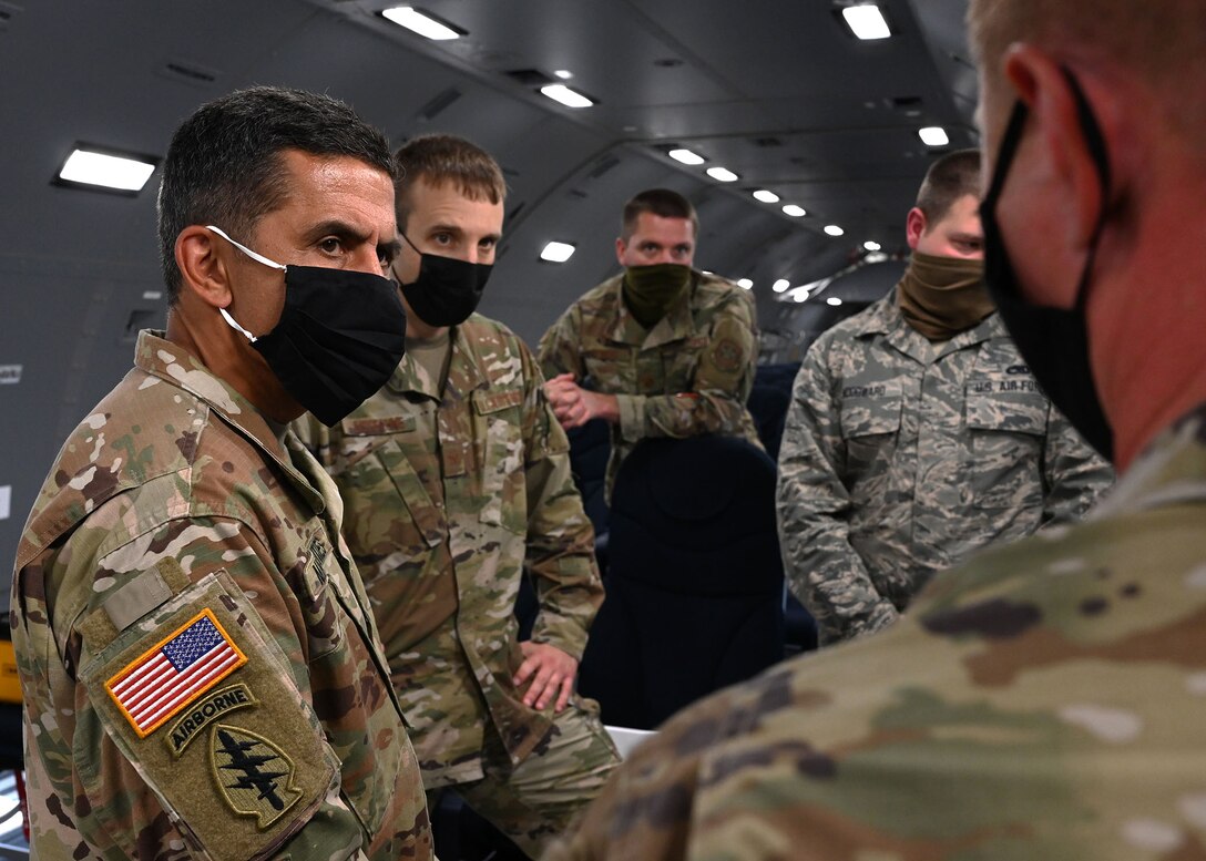 From left, NH Adjutant Gen. David Mikolaities, Col. Brian Jusseaume, Maj. Daniel Sawicki, and Staff Sgt. John Woodward listen as Tech Sgt. Andrew Morrison, an aircraft structural maintainer, explains recent innovations implemented for the KC-46 program. Photo by Staff Sgt. Charles Johnston, deputy state PAO.