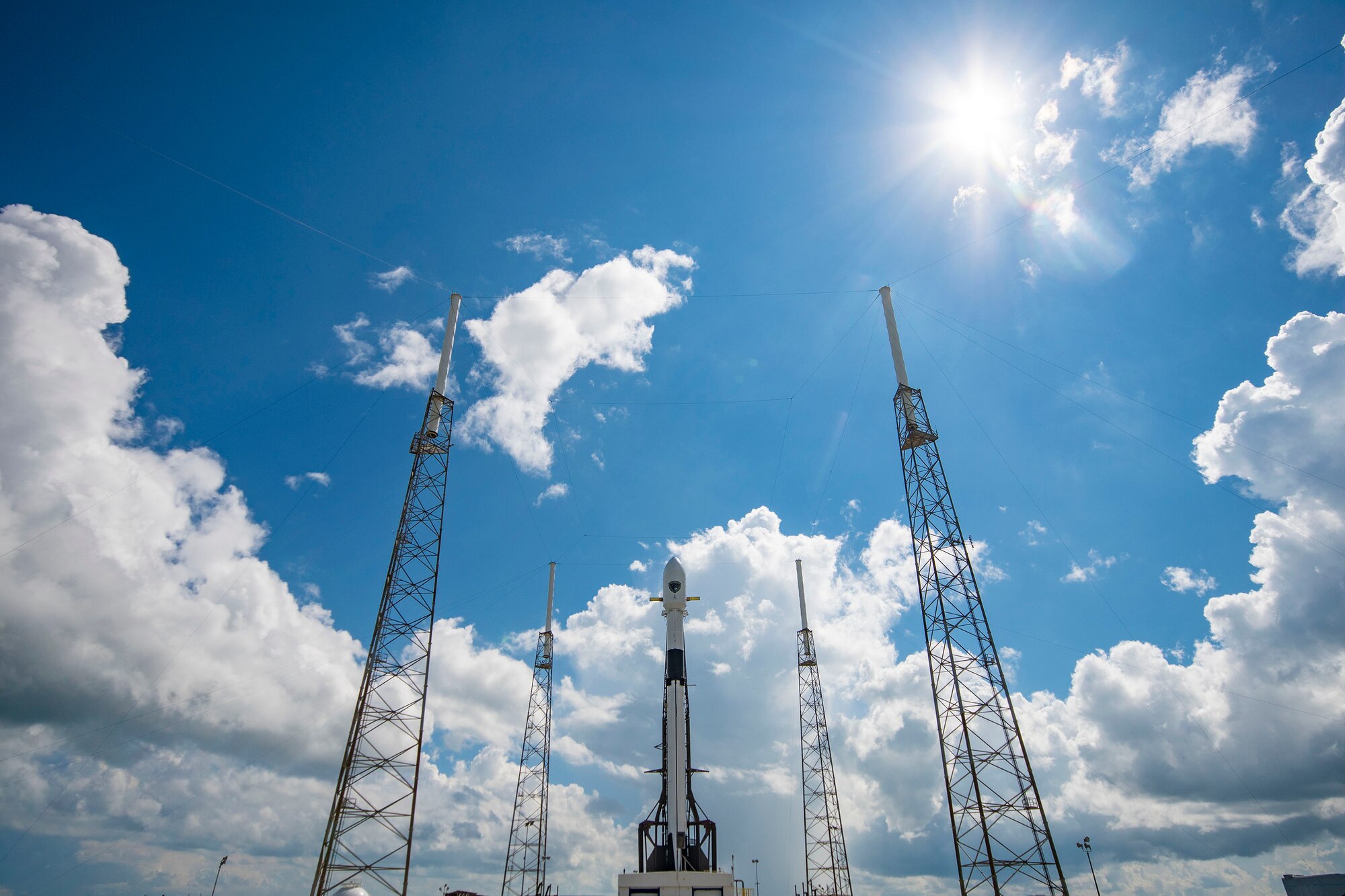 A Falcon 9 with GPS III SV 04 encapsulated inside the payload fairing the stands vertical on the pad at Cape Canaveral’s Space Launch Complex 40 in preparation for its Sept. 30 launch. The satellite will augment the current GPS constellation comprised of 31 operational spacecraft in Medium Earth Orbit (MEO). (Photo courtesy of SpaceX)
